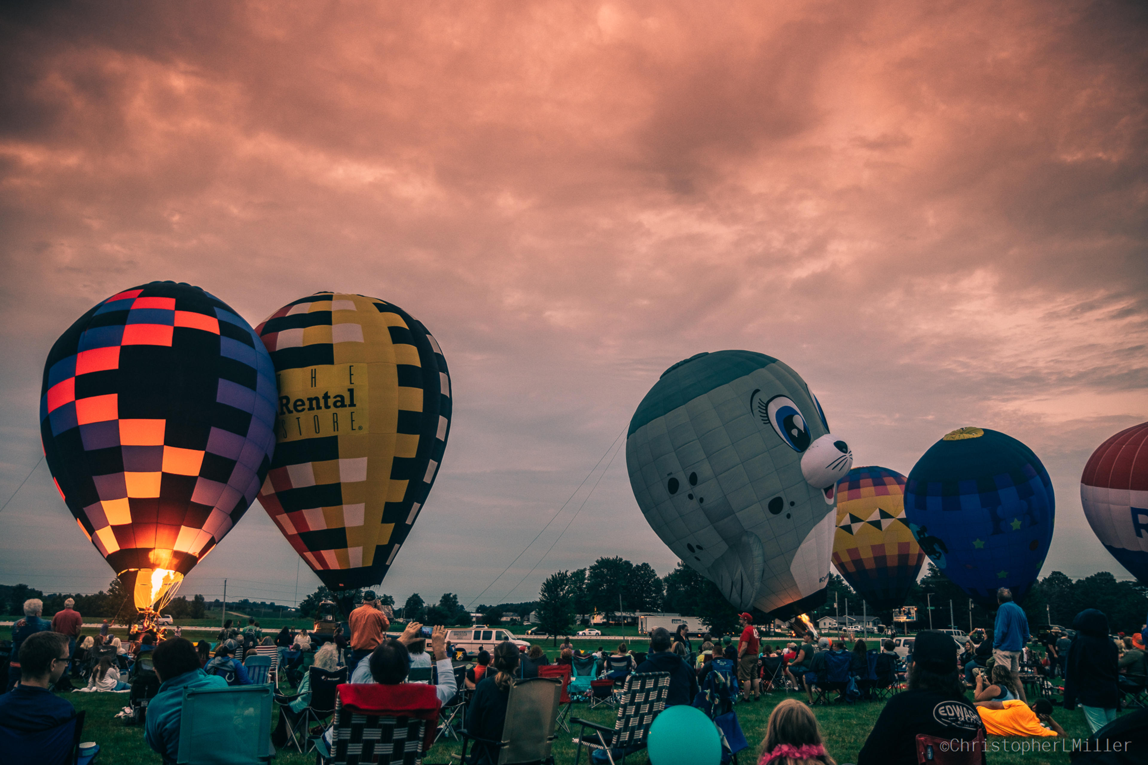 Dramatic Clouds with some Glowing Balloons